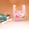 100pcs / lot Supermarché Shopping Sacs en plastique Pink Cherry Blossom Vest Gift Cosmetic Bags Sac d'emballage alimentaire Candy Bag 220822