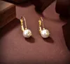 Vogue Simple Lady Pearl Diamonds Earrings Stud Western Queen Planet Star Aura Högkvalitativ lyxiga smycken Kvinnor Saturnör örhängen Designer smycken gåvor H13