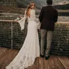 Bohemian Mermaid Wedding Dresses Lace Backless Bridal Gowns Long Sleeves V Neck Plus Size Trumpet Sweep Train robe de mariee