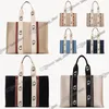 Woody Tote Påsar Luxury Designer Woody Totes Basket Stripes Signature Logo Ribbon Wide Handle Läder Crossbody Axla Small Shop217o