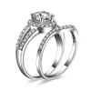 Ainuoshi Luxo 1 quilates Anéis de noivado de mulheres Conjunto 925 Solid Sterling Silver Halo Bague de alta qualidade Anel de noiva Conjunto para Party Y203922060