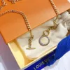 Collana d'amore Designer pendenti da donna Retro abbellimento bronzo 2022 Collane con ciondolo a catena con ciondolo Gioielli in ottone di moda