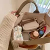 Blöja väskor mamma stor kapacitet multifunktion bärbar en axel mamma pack baby barnvagn hängande säck en langer 220826