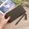 Carteiras Moda Moda Longa carteira feminina Luxo de luxo PU Lychee Padrão Lady Clutch Tassel Pingente Pingle para Bag Female Card Solter