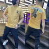 Męskie T-shirty Mały nadruk w misie Męskie koszulki Trend Lato Dorywczo Luźna Bawełna merceryzowana Okrągły dekolt Modna odzież typu streetwear M-7XL