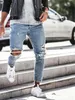 Jeans da uomo Jeans skinny azzurri uomo Streetwear Jeans strappati distrutti Homme Hip Hop Rotto modis maschile Matita Biker Scava fuori Jean Pantaloni 220827