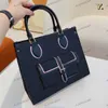 Borse mm onthego m46154 borse cadute per te 2022ss womens di design di lusso monogrammi sulla borsa per lo shopping 35 cm