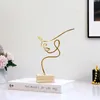 Oggetti decorativi Figurine Decorazioni per la casa nordica Figura Volto di donna Sculture astratte Arte del metallo Linee oro nero Ornamenti fatti a mano Decorazione della stanza moderna 220827