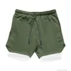 Shorts casuais shorts de AV masculino de verão nova tendência de fitness de fitness em corrida de calças curtas de calças soltas 2 em 1