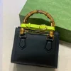 Borse tote firmate Donna Mini Borsa in bambù Borsa a mano Portafoglio di marca di lusso a tracolla con manico in bambù leggero Cinturini con fibbia colorati alla moda GG20cm