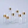 Clear Glass Essential Oil Parfume Bottle Liquid Droper Bottle With Gold Cap för att ersätta körförpackning Kosmetisk behållare 5 ml 10 ml 15 ml 20 ml 30 ml 50 ml