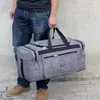 Duffel Bags Oxford Водонепроницаемые мужчины путешествуют рукой ручной багаж большие сумки в течение ночи Duffle Business Winday Weekend
