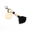 Porte-clés en perles de Silicone avec pompon en coton personnalisé, vente en gros, disque en bois sculpté, style Boho, droit