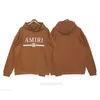 Amiirisis Designer Hoodie Pullover Sweatshirt Long Sleeve Fall Casual The Pritical عالية الجودة مقنعًا مع معطف كبير متعدد الاستخدامات Wujt