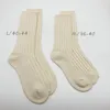 Calzini maschili primaverili nativi cotone quattro stagioni spesse lunghe tube sportive ago bianco ago maschile e donne casual