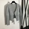 Pulls pour femmes Designer Slim Knit Knits Tops avec des lettres Button Girls Milan Runway Col en V Crop Top Shirt Haut de gamme à manches longues Stretch Cardigan Tee XSW4