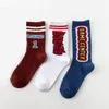 Chaussettes pour hommes Design Original Texte Rue Harajuku Style Lettrage Marée Marque Hong Kong Hommes Et Femmes Amoureux Skate Chaussette