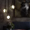 قلادة مصابيح شخصية غرفة المعيشة الإبداعية LED LED NORDIC YO-YO مطعم مطعم صغير الثورة بسيطة مصباح سرير غرفة نوم بسيطة