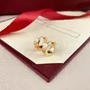 Designerskie kolczyki kobiety złoty modny urok kolczyk wysokiej jakości stal nierdzewna luksusowe kolczyki sztyfty wesele prezenty dla par biżuteria zaręczynowa dla nowożeńców