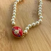 Подвесные ожерелья Lisa то же самое жемчужное ожерелье панк сладкий прохладный стиль Западный Вивиан Вествуд Эмаль Сатурн Жемчужный ожерелье женского нового стиля