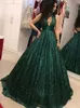 Abiti da ballo con paillettes verde scuro glitterati Abiti da sera lunghi con scollo a V profondo senza schienale sexy Abiti da sera scintillanti affascinanti per occasioni speciali per le donne