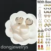 Pendientes de diseñador de lujo Pendientes vintage de pendientes Pendientes de oro en forma de corazón Joya de colgante de cartas en forma de corazón Dongjewsrys