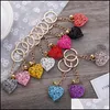 Keychains 20pcs/lote atacado Hollow Heart Keychains Fashion Charm fofo bolsa de bolsa pendente Corrente de chaveiro Ornamentos de presente mjfashion dh02x