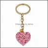 Keychains 20pcs/lote atacado Hollow Heart Keychains Fashion Charm fofo bolsa de bolsa pendente Corrente de chaveiro Ornamentos de presente mjfashion dh02x
