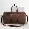 Дизайнер -Качественные мужчины Duffle Bearg Bag Women Women Hand Luggage Travel Bags Мужские кожаные сумки PU большие сумки с поперечным телом сумки 55 см.