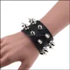 Charm Bracelets Linda pulseira de couro exclusiva quatro fileiras cuspidal spikes rebite stud largo punk rock gótico unissex manguito pulseira Yydhhome Dh3Ey