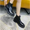 Moda tasarımcı marka ayak bileği botları kadın siyah deri savaş botları düz topuk kış botları en kaliteli ve platform kadın ayakkabı fabrika
