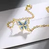 Braccialetti a maglie Ciondolo a farfalla blu squisito Catena color oro Braccialetti femminili Piccolo ciondolo in pietra di cristallo di zirconi per le donne