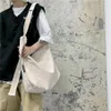 حقيبة Canvas Canvas Bag Black Wild Trendy Trendy Japanese Harajuku Messenger الكتف الكتف كبير السعة الكبرى للنساء 2594