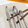 Set di posate in argento dorato cucchiaio forchetta coltello da cucina da campo intaglio set di stoviglie per tè in acciaio inossidabile utensili da cucina 304