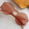 Солнцезащитные очки для роскошных дизайнеров моды для женщин Тенденция Тенденции Раунд Rimless Ungize Sun Glasses Summer Avantgarde Style Antia3475711