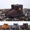 Designer Australien Schneeschuhe Stiefel mittlere Röhrchen Mode warme Frauen Herren Kinder Baumwollschuhe Bowknot Bohrer Schneeschuhgröße 24-43