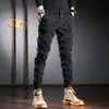 Męskie dżinsy ly mody mody Mężczyźni Wysokiej jakości splicowane patchwork Casual Cargo Spodnie Streetwear Hip Hop Joggers Harem Spodery 220831