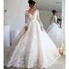 2023 Vestidos de bola de bola de bola completa de luxo ilus￣o de vestidos de noiva vestidos de noiva abertos de manga longa vestidos de noiva