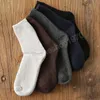 Hiver chaud hommes chaussettes épaissir laine chaussettes éponge thermique Tube chaussette Super épais couleur unie rayé chaussette contre les bottes en peluche froides