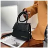 Design Tasche Fabrik Großhandel und Einzelhandel Tasche Frauen Neue Mode Koreanische Frauen Net Rot Trend Hand Einfache Einfarbig Einzelne schulter Unterarm