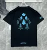 Lyx mode mens t skjortor designer man kvinnor t-shirt hästsko blommor tees sommar kors sanskrit brev kort ärm tshirts topp tröja hip hop tröja e94