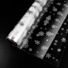 Rotolo di carta in cellophane per confezioni regalo Natale trasparente Avvolgimento di sacchetti di fiocchi di neve Foglio di cestino per rotoli di plastica per fiori di Natale