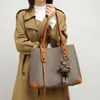 Bolsas femininas bolsas de caçamba de neonoe de alta qualidade Bolsas de ombro crossbody letra clássica Carteira de couro genuíno bolsa de cordão 165