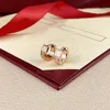 Brincos de argola Brincos de diamante de diamante dourado parafuso de aço de titânio Earros de amor para mulheres requintadas moda simples 18k círculo de ouro