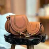 Luxe zadeltas Tassen rundleer Dames MARCIE kleine bakken crossbody Clutch Flap Designer heren handtas Tassen mode vintage cadeau reizen cosmetisch weekend