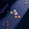 Nieuw ontworpen ros￩gouden bloemen hanger dames geluk ketting volledige diamant vier bloemblaadjes bloem turquoise erhombic arrings ring ontwerper sieraden 021