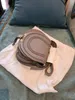 Lyx sadel shouder Väskor nötskinn Dam MARCIE små väskor crossbody Kopplingsklaff Designer handväska herr Väskor mode vintage present resor kosmetika helg