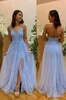 Vestidos de baile azul de azul claro Apliques de renda com miçangas em Varda de espaguete de pescoço uma linha de tule tule tule backless noite partido formal