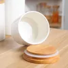 Bottiglie di stoccaggio Lattina sigillata in ceramica con coperchio in bambù Barattolo di spezie creative Zucchero Contenitore per caffè Contenitore per grani Serbatoio da cucina Organizer