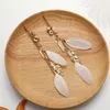 Boucles d'oreilles pendantes bohème plume femme bijoux Style ethnique fait main en bois perle feuille chaîne Boho Long gland